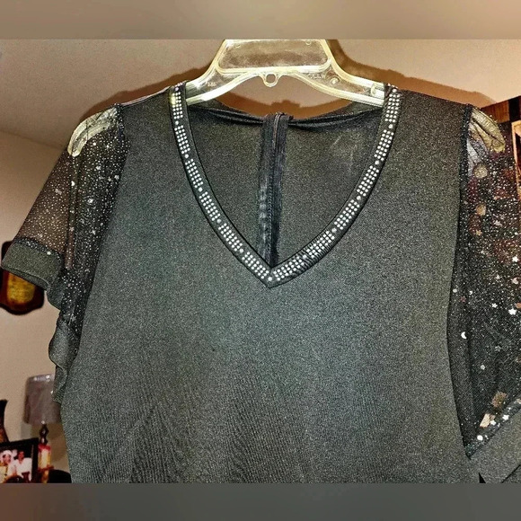 A black dinner dress size L. - Picture 3 of 3